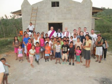 Group of students and children with priests