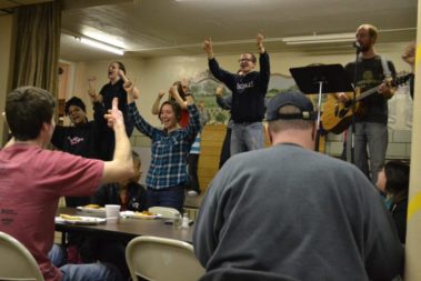 Group of volunteers singing