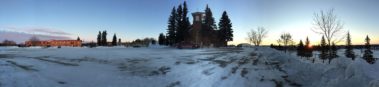 Snowy landscape with a church at the center