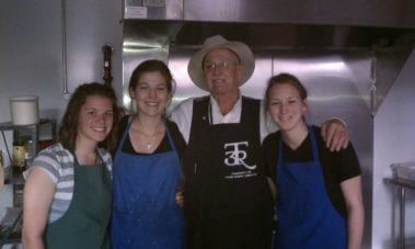 Students volunteering in a kitchen