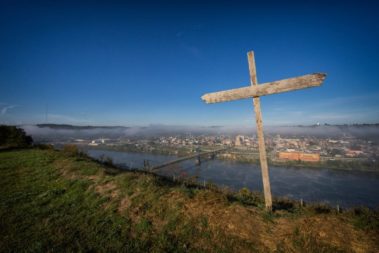 A wooden cross overlooking the city of Steubenville