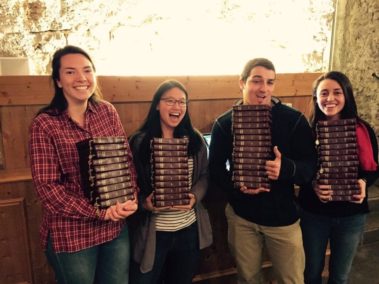 Students holding books